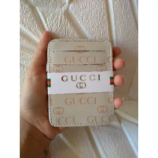 Várias marcas e modelos de Carteira Masculina Mágica unissex - versace branca\roxo