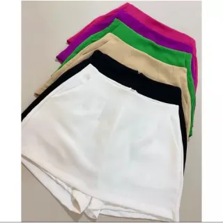 Saia curta Zara 2023: tendência moda blogueiras - Nude