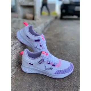 Moda conforto feminina: Tênis esportivo estilo telinha, leve e moderno - Lilás